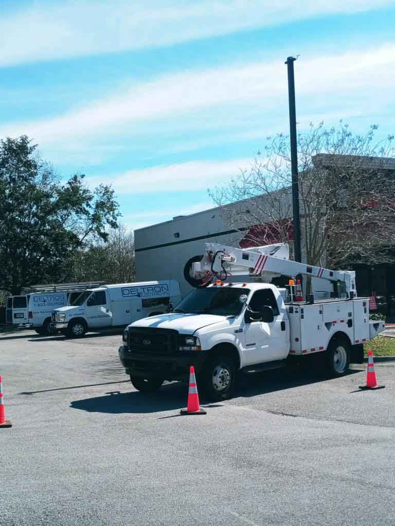 Deltron Electric Bucket Truck and Vans