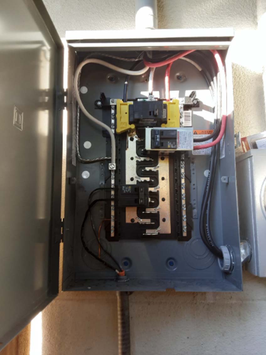 Overloaded electrical circuit causing electrical short and fire