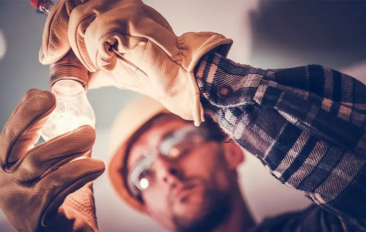 Electrician Installing a Fixture