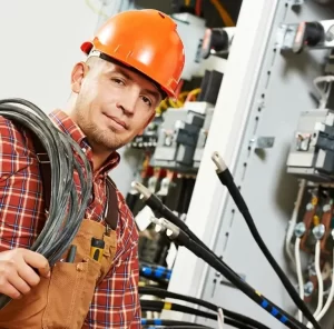 technician fixing electrical panel in Meritt Island, FL