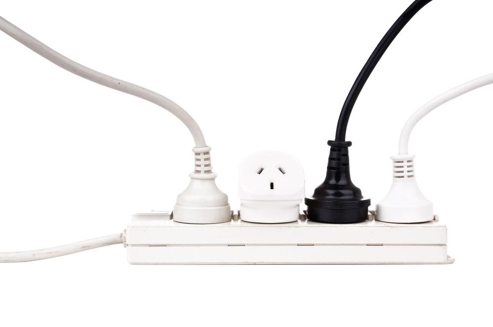an overloaded extension cord an overloaded extension cord