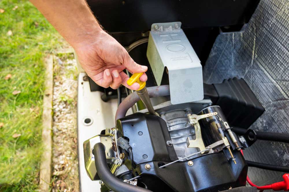 Deltron technician working on generator repairs and maintenance